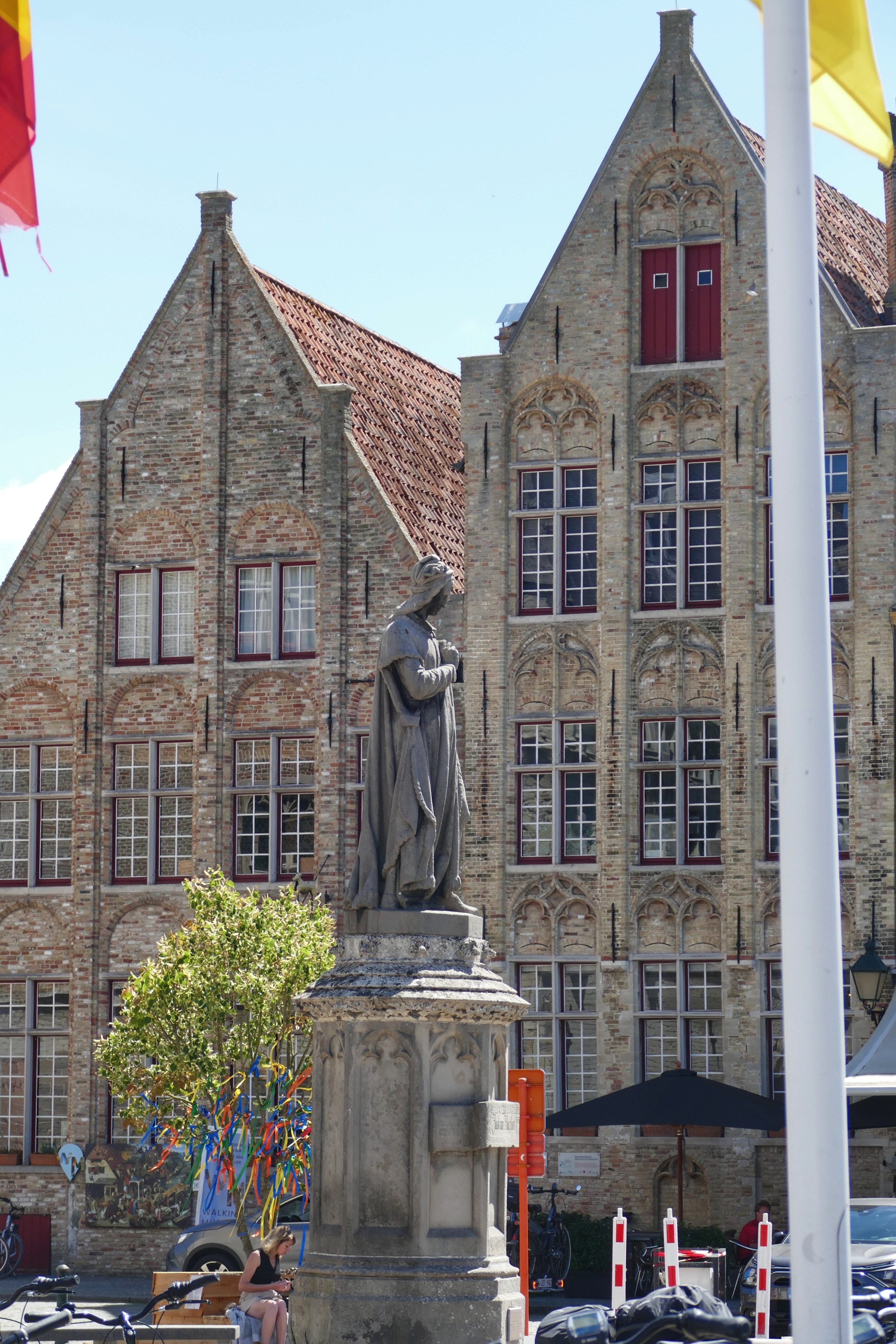 statue on market square medieval Damme