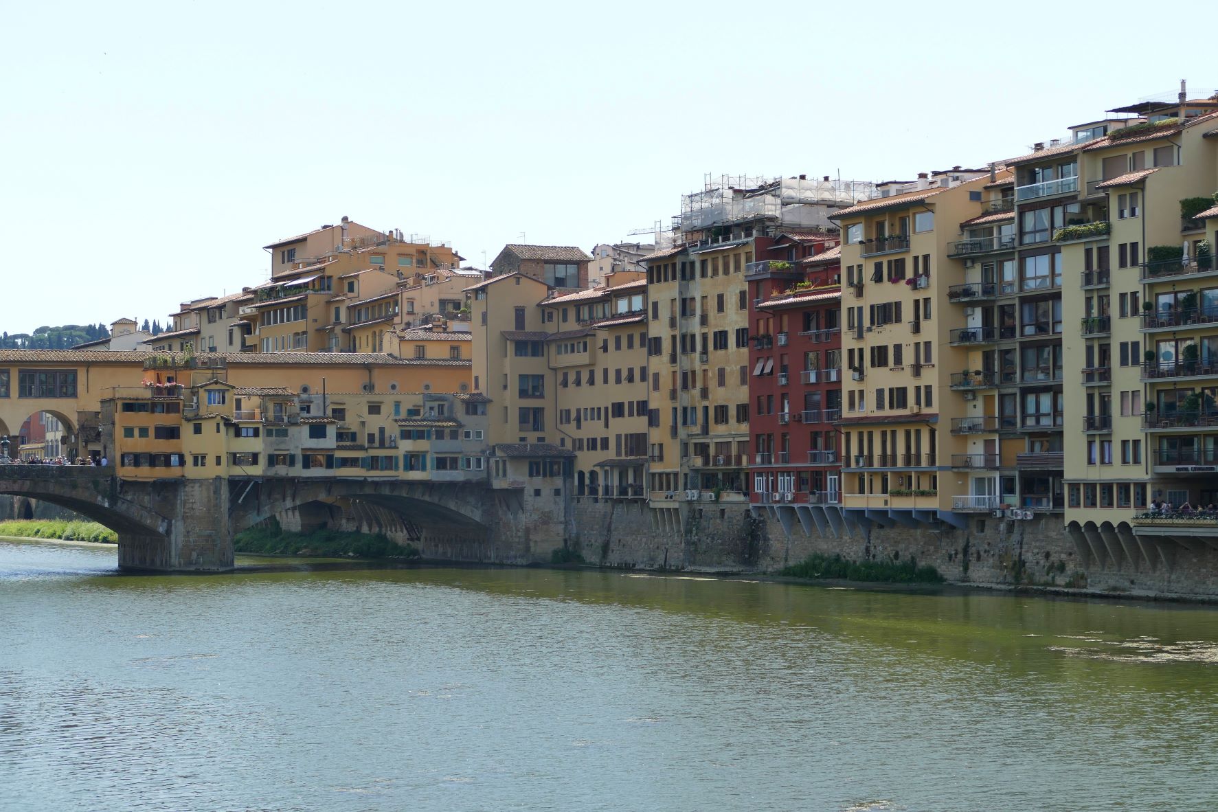 view on Ponte Vecchio from river bank
